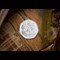The 2020 Official Peter Pan 50p Coin on wooden surface